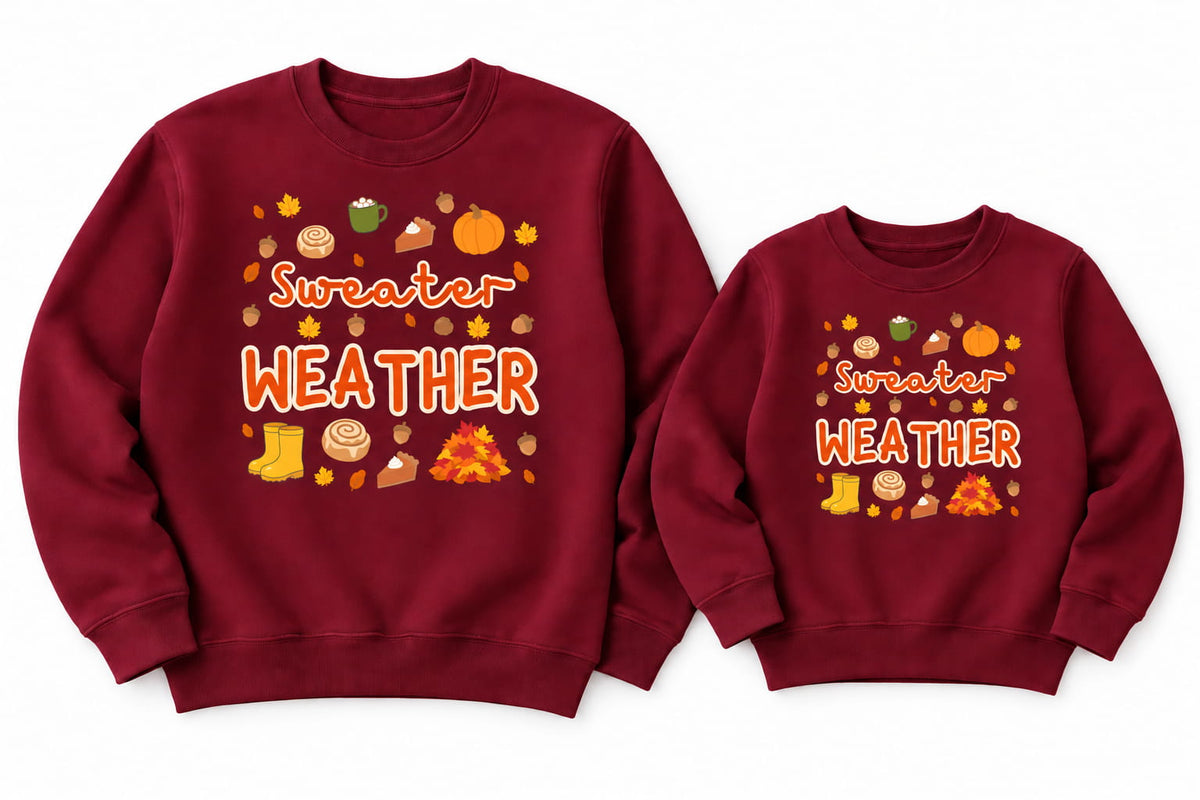 Adult and children's burgundy Sweater Weather printed sweatshirts laid flat